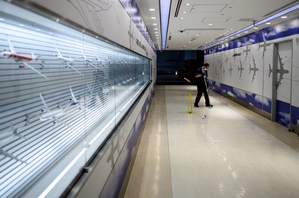 Japanese companies are required to find new workplaces in the same job category for foreign employees they dismiss for reasons such as deteriorating earnings. (AFP)