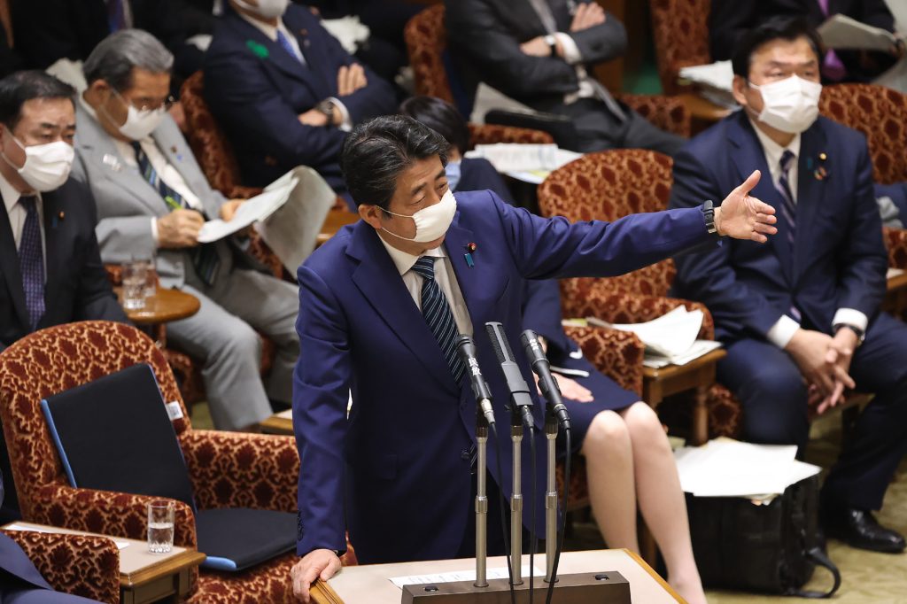 Abe claimed at a parliamentary committee meeting that stipulating in the top law what roles the government and the people should play in emergencies is a very significant issue. (AFP)