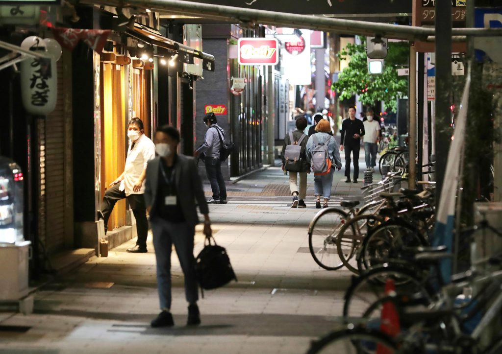The state of emergency remains in place for the eight prefectures with the special alert status, where intensive measures against COVID-19 are still necessary. (AFP)