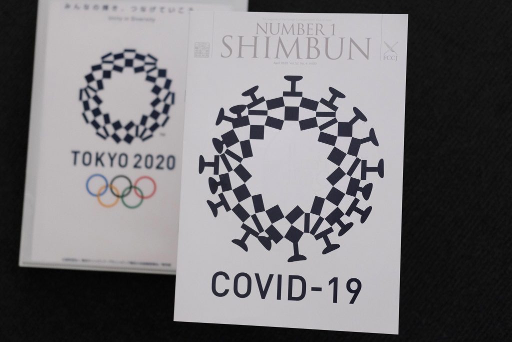 The cover image of the April issue of the Number 1 Shimbun magazine depicted an image of the circular checkered-pattern emblem of the 2020 Games added with club-shaped spikes. (AFP)