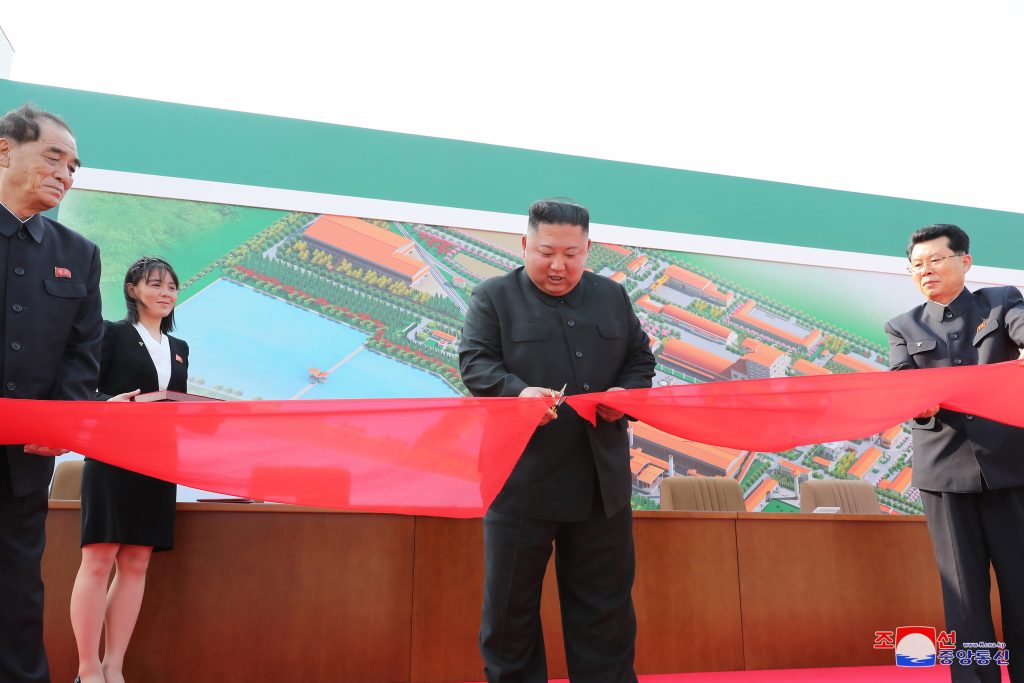  A photo released by the official North Korean Central News Agency (KCNA) shows North Korean leader Kim Jong-un (C) cutting a ribon at a completion ceremony of a factory, which has been built as the production base of Juche fertilizer, on May Day, in Sunchon, North Korea, 01 May 2020. (EPA)