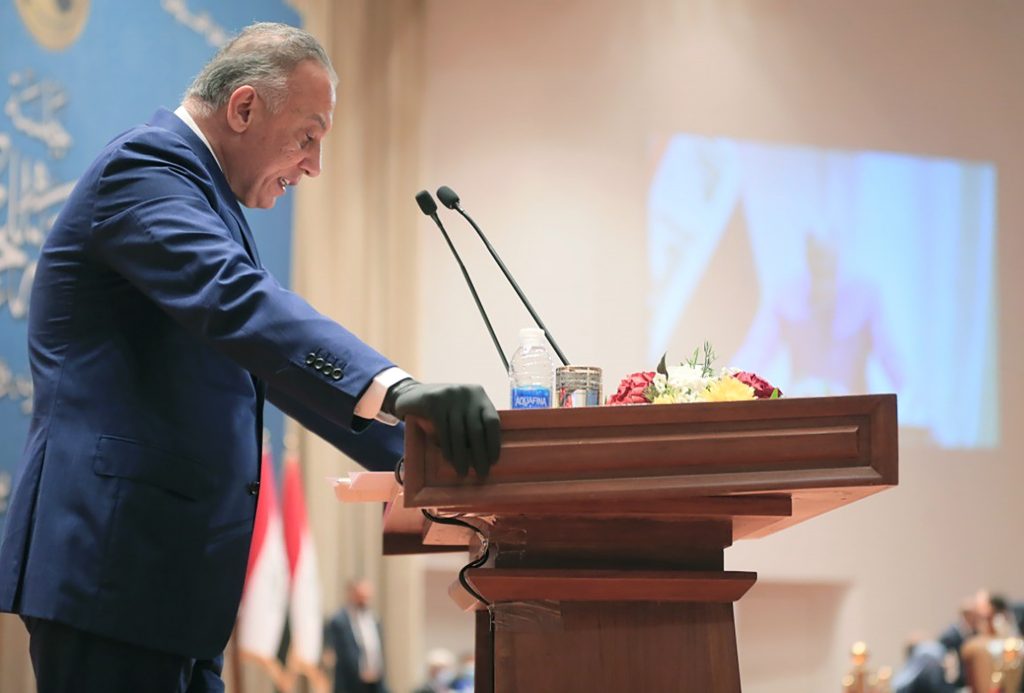 This handout picture released and taken by the Iraqi Parliament's press office early on May 7, 2020 shows Iraq's new Prime Minister Mustafa Kadhemi addressing the parliament during an overnight session in Baghdad. (AFP)
