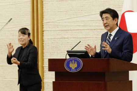 Abe agreed with European Council President Charles Michel and European Commission President Ursula von der Leyen that Japan and the EU will closely cooperate to prevent the virus from spreading further. (AFP)