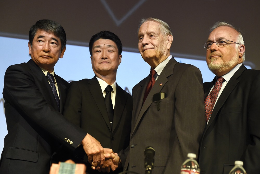Yukio Okamoto (extreme left) died on April 24 at the age of 74. (AFP/file)