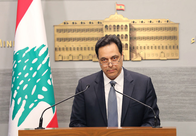 Lebanese Prime Minister Hassan Diab delivering a statement at the governmental palace in the capital Beirut. (File/AFP)