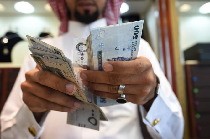 SAMA said it remained committed to maintaining the exchange rate of SR3.75 to the dollar. (AFP/File)