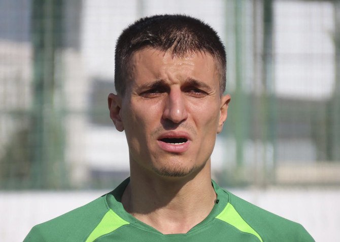 In this undated but recent photograph, footballer Cevher Toktas, 32, is seen prior to a soccer match in the northwestern province of Bursa, Turkey. (AP)