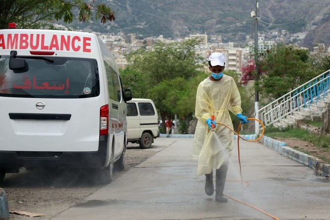 Yemeni worker sprays disinfectant at the Al-Thawra General Hospital a day after the second case of COVID-19 was confirmed in Yemen's third city of Taiz. (AFP)