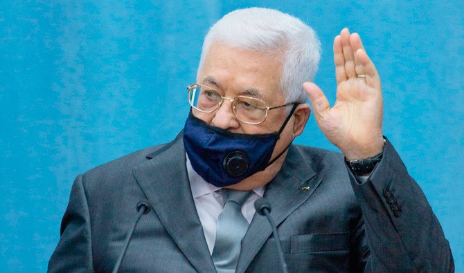 Palestinian President Mahmoud Abbas upon arriving to head the Palestinian leadership meeting at his headquarters, in the West Bank city of Ramallah, during the COVID-19 pandemic on May 7, 2020. (AFP)