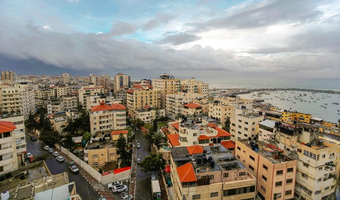 A photo taken on January 10, 2020, shows dark clouds over of gaza city during heavy rain. (AFP)