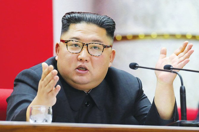 A file picture of North Korean leader Kim Jong Un, left, taken in 2019. (AFP)