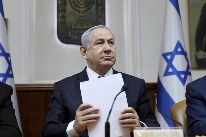 Israeli Prime Minister Benjamin Netanyahu was indicted in November on bribery, fraud and breach of trust charges in three cases. (AFP)