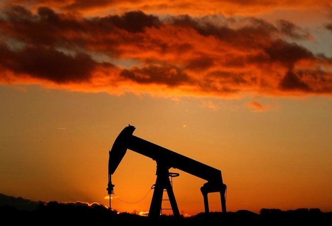 An oil pump is seen at sunset outside Scheibenhard, near Strasbourg, France, October 6, 2017. (Reuters)