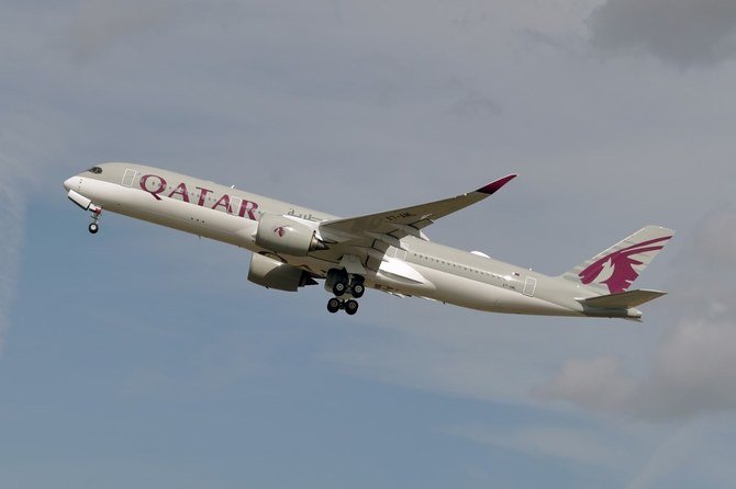 File photo from September 27, 2019 shows an Airbus A350 of Qatar Airways company after taking off from the Toulouse-Blagnac airport, near Toulouse. (AFP)