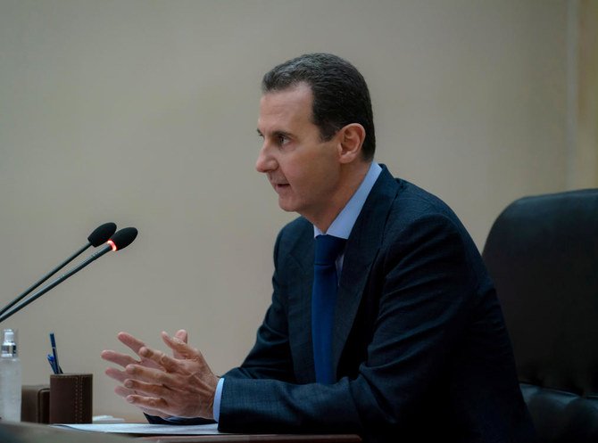 Syrian President Bashar al-Assad addresses the government committee that oversees measures to curb the spread of the coronavirus disease (COVID-19), in Damascus, Syria in this handout released by SANA on May 4, 2020. (SANA via Reuters)