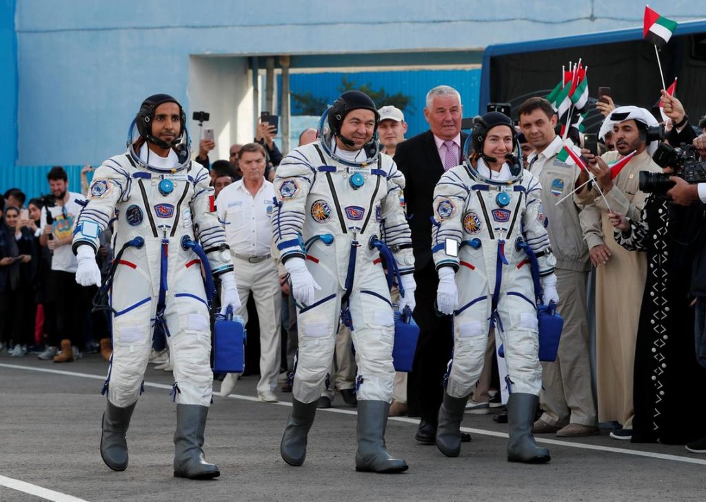 ISS crew members including Hazza Al Mansouri of the UAE, left, walk to the launchpad at the Baikonur Cosmodrome, Kazakhstan, last year. (Reuters)