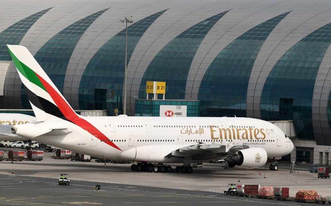 An Emirates Airbus A380-842 aircraft is pictured grounded at Dubai international Airport in Dubai after the airline suspended all passenger operations amid the COVID-19 coronavirus pandemic. (AFP / KARIM SAHIB)