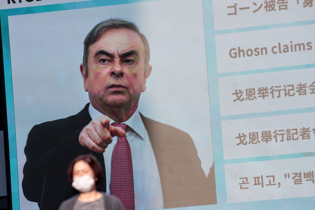 Former Renault-Nissan boss Carlos Ghosn addresses a large crowd of journalists on his reasons for dodging trial in Japan where he is accused of financial misconduct, at the Lebanese Press Syndicate in Beirut on January 8, 2020. (AFP)