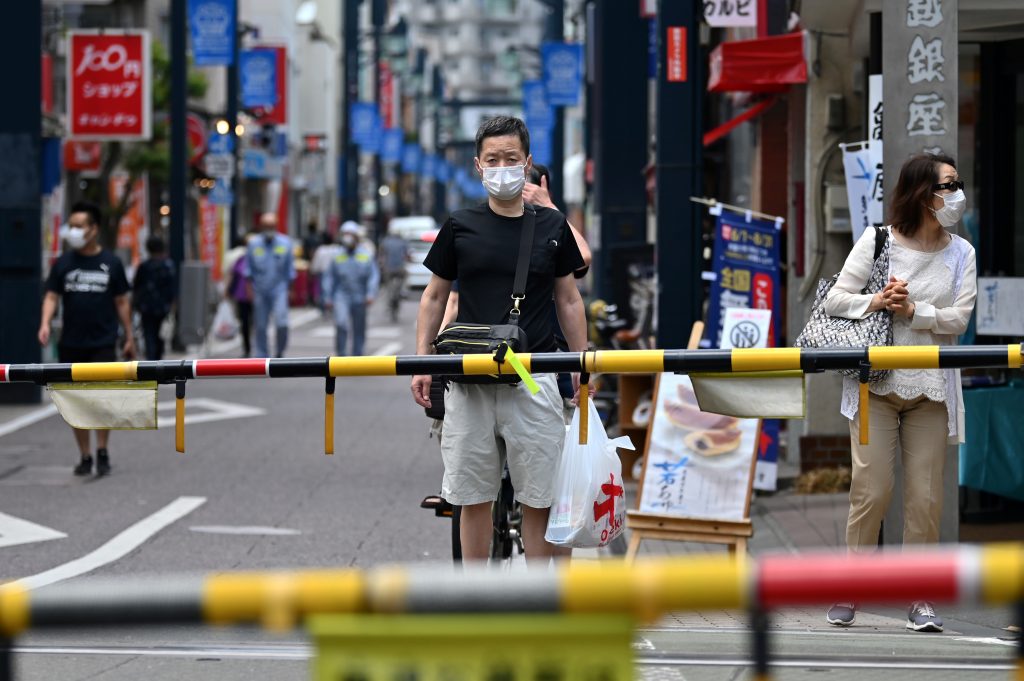 In Tokyo, 13 new infection cases were recorded Monday. The daily figure topped 10 for the eighth consecutive day. (AFP)