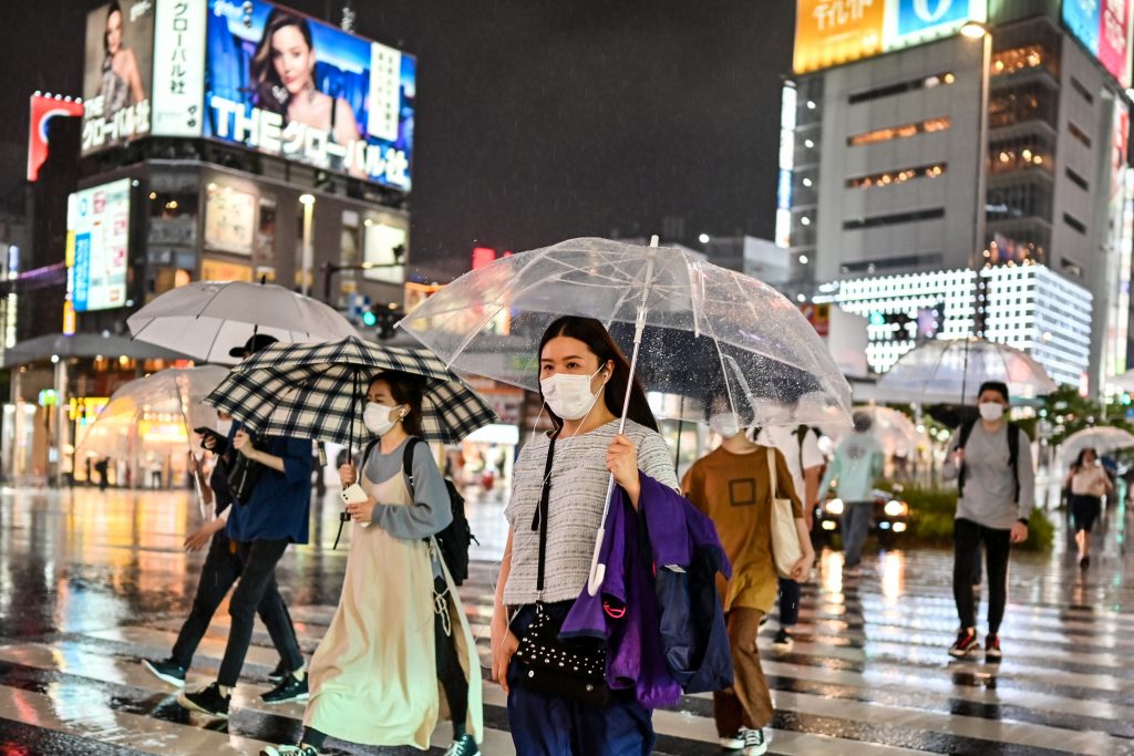 People in Tokyo are going back to their hometowns after travel restrictions were lifted. (AFP)
