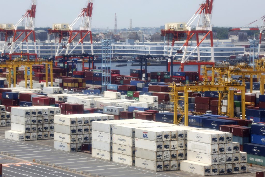 Containers are piled up at a port in Yokohama, south of Tokyo Wednesday, June 17, 2020. (File photo/AP)
