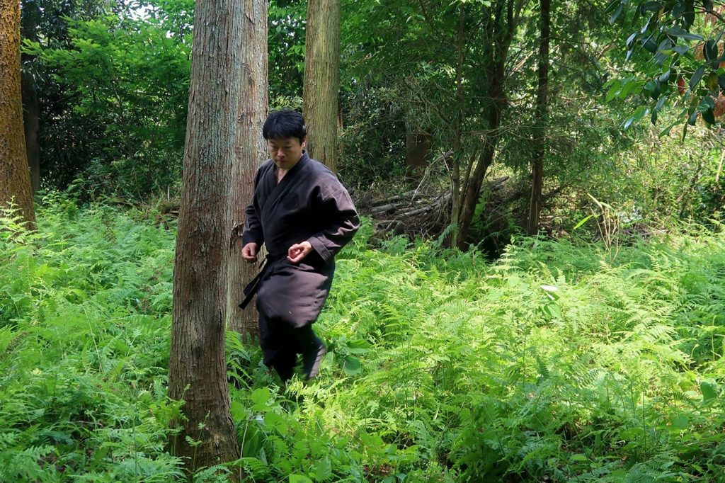 This undated handout photo received on June 26, 2020 courtesy of Genichi Mitsuhashi shows his ninja training in Iga, Mie prefecture. Genichi Mitsuhashi has become the first student ever to graduate from a Japanese university with a master's degree in ninja studies. (AFP Photo/Courtesy of Genichi Mitsuhashi)