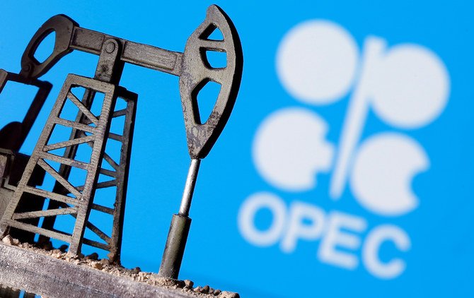 A 3D printed oil pump jack is seen in front of displayed Opec logo in this illustration picture, April 14, 2020. (Reuters/File Photo)