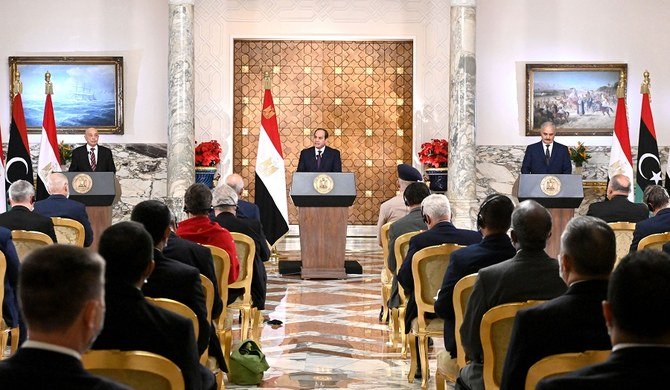 A handout picture released by the Egyptian Presidency on June 6, 2020 shows Egyptian President Abdel Fattah al-Sisi (C), Libyan commander Khalifa Haftar (R) and the Libyan Parliament speaker Aguila Saleh (L) taking part in a joint press conference in the capital Cairo. (File/AFP)