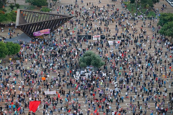 Protesters gather in Tel Aviv's Rabin Square on June 6, 2020, to denounce Israel's plan to annex parts of the occupied West Bank. (AFP)