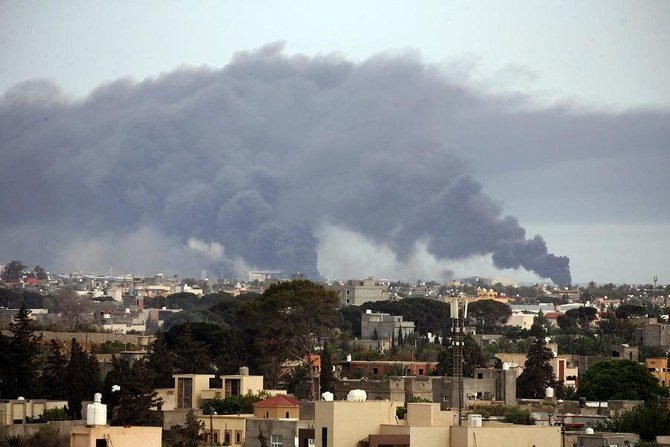 Smoke fumes rise above buildings in the Libyan capital Tripoli, during reported shelling by strongman Khalifa Haftar's forces, on May 9, 2020. (File/AFP)