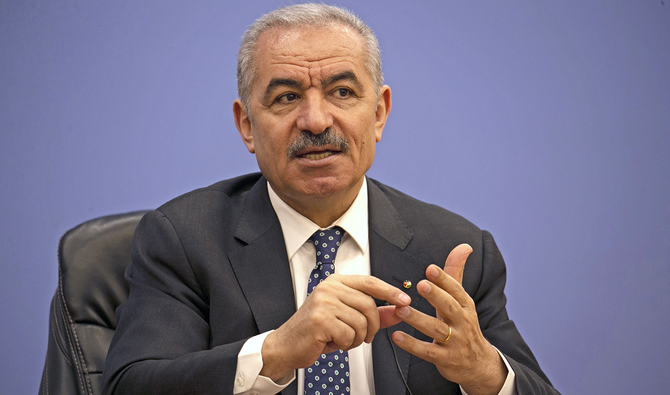 Palestinian Prime Minister Mohammad Shtayyeh speaks during a press conference at the Foreign Press Association in the West Bank city of Ramallah, on Tuesday, June 9, 2020. (AP)