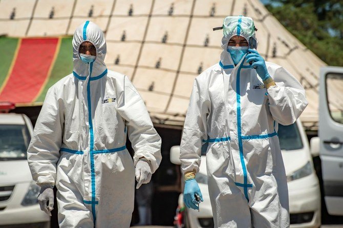 A dozen ambulances were stationed in Moulay Bousselham, above, one of the quarantined towns, ready to be dispatched to pick up confirmed cases. (AFP)