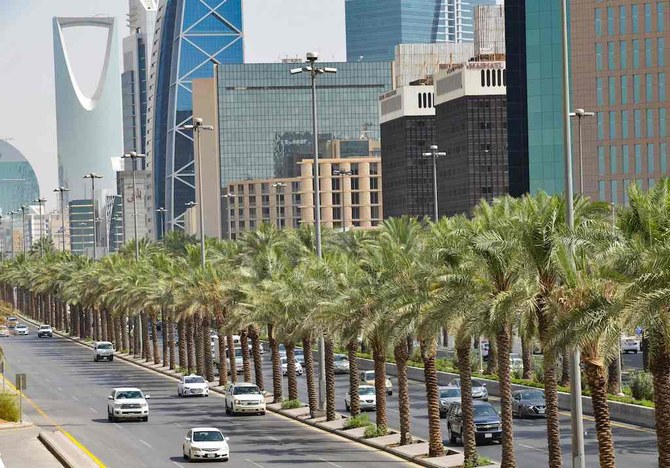 Cars drive down King Fahad boulevard after the authorities eased some of the lockdown measures that had been imposed in a bid to slow down the spead of the novel coronavirus, in the Saudi capital Riyadh on June 21, 2020. (AFP)