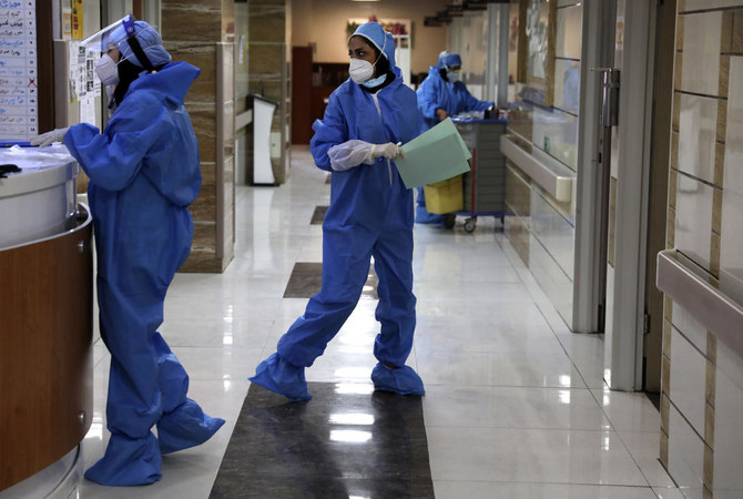 In this Tuesday, June 16, 2020, photo, nurses work in a COVID-19 ward of the Shohadaye Tajrish Hospital in Tehran, Iran. (AP)
