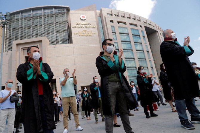 Lawyers gather in front of the Justice Palace to demonstrate against the police stopping senior lawyers marching to the capital Ankara in a protest against a draft bill governing the organisation of bar associations in Istanbul. (Reuters)