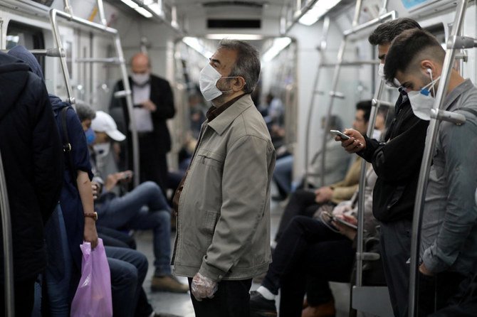 Mask-wearing would be “obligatory in covered spaces where there are gatherings,” the Iranian leadership said. (WANA via Reuters)