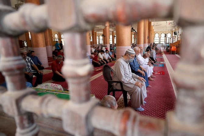 Worshippers perform the Dhuhr (noon) prayers in Al-Abbas mosque in Gaza City on June 3, 2020. (Reuters)