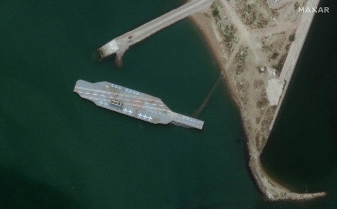 The fake aircraft carrier is seen off the coast of Bandar Abbas, Iran. (Satellite image ©2020 Maxar Technologies via AP)