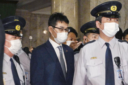 Former Japanese Justice Minister Katsuyuki Kawai leaves the venue of a lower house plenary session in Tokyo, Japan, on June17, 2020. (Kyodo/via Reuters)