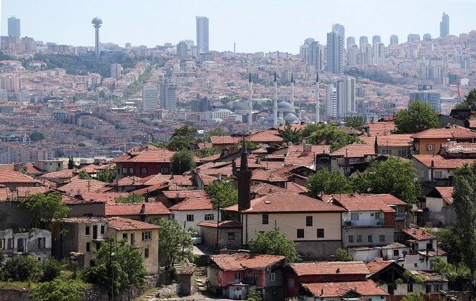 A photo taken from Hidirliktepe in Ankara on May 25, 2020 shows high modern buildings in the city's Cankaya district and the historical Kayabasi neighborhood. (File/AFP)