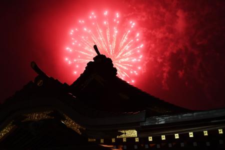Fireworks explode over the Okunitama shinto shrine in Fuchu in the western suburbs of Tokyo on Monday. (AFP)