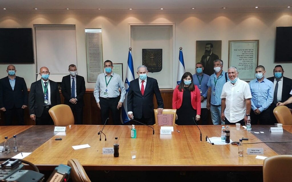 Benjamin Netanyahu and Settlements Minister Tzipi Hotovely, 6th from left, meet with settler leaders in the PM’s Office, on June 7, 2020. (Supplied)