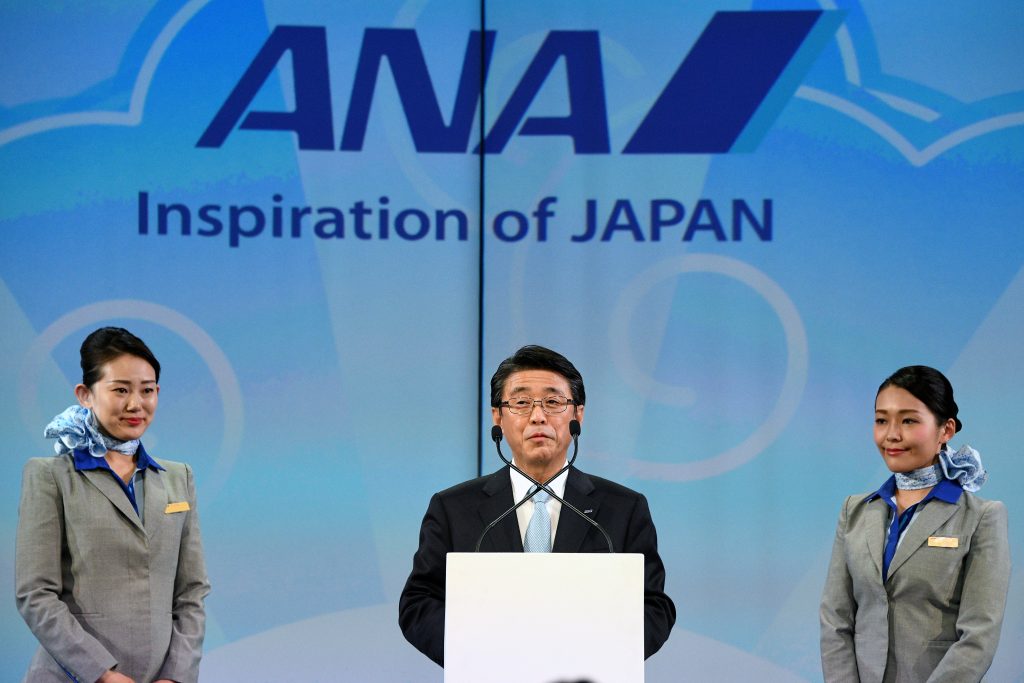 The President and CEO of ANA Holdings Inc Shinya Katanozaka speacks during a ceremony on March 20, 2019. (AFP)