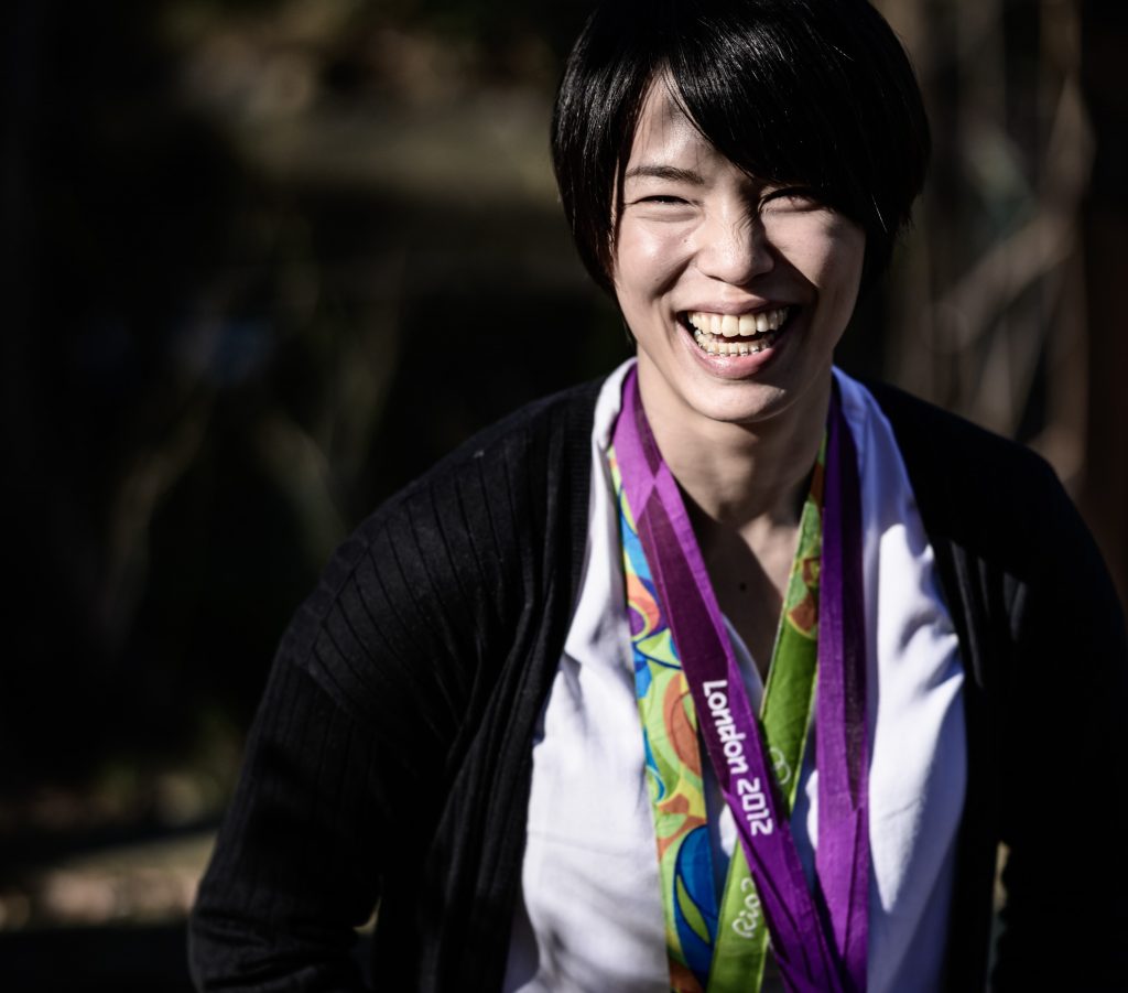 In this picture taken on February 18, 2020, Japanese two-time Olympic judo medallist Kaori Matsumoto, who won gold at London 2012 and bronze at the Rio 2016 Olympics and is a member of the Japanese Olympic Committee, poses with her medals during an interview with AFP in Tokyo. (AFP)