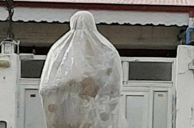 The Bandar Anzali figure was widely mocked was last seen covered in white sheeting. (Twitter)
