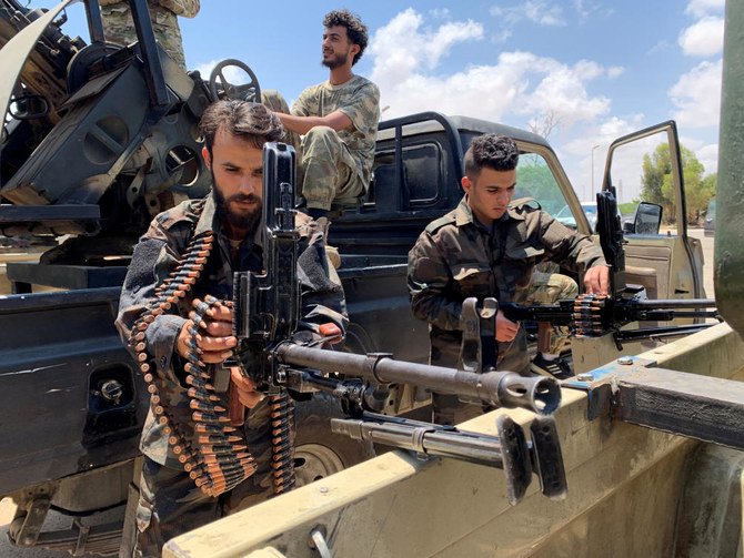 Troops loyal to Libya's internationally recognized government prepare themselves before heading to Sirte, in Tripoli, Libya, Libya July 6, 2020. (Reuters)