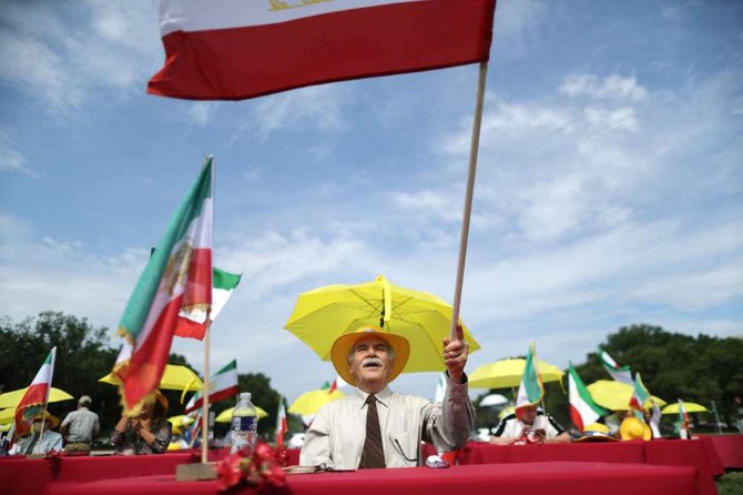 Iranian-Americans wave the national flag of Iran from 1910 to 1980 outside the US Capitol in Washington, DC, on July 17, 2020 to demonstrate in support of a free Iran. (AFP)