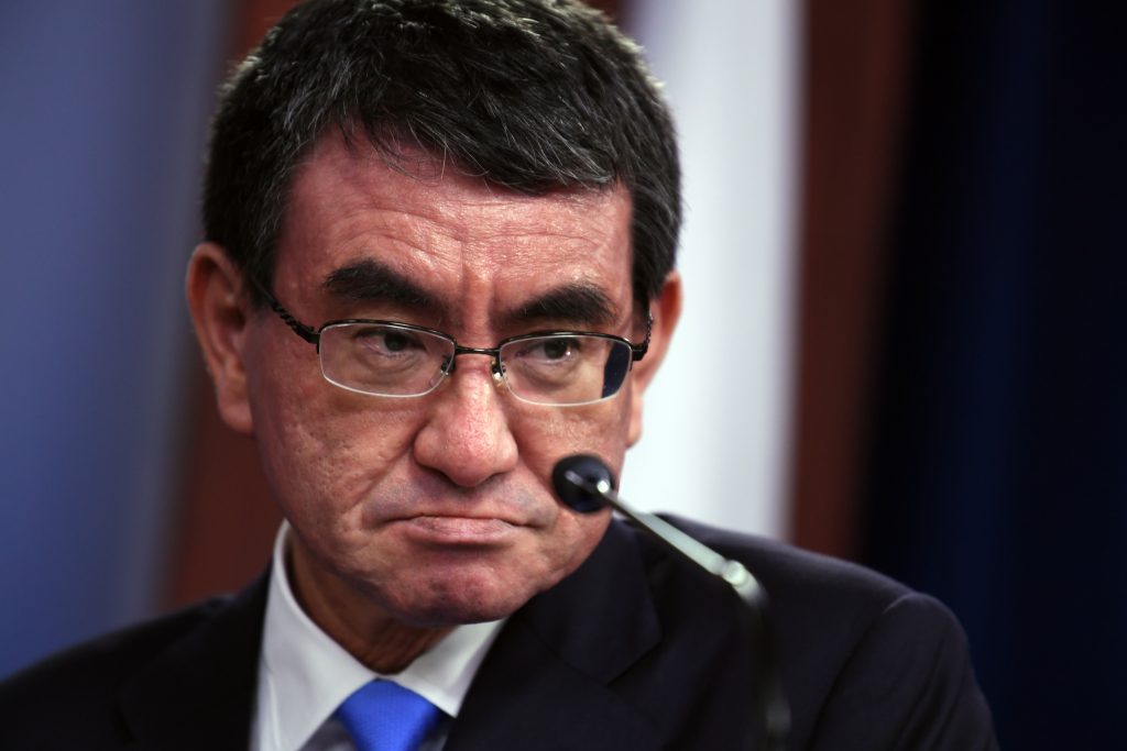 Defense Minister Taro Kono always wore a mask during work. (AFP)