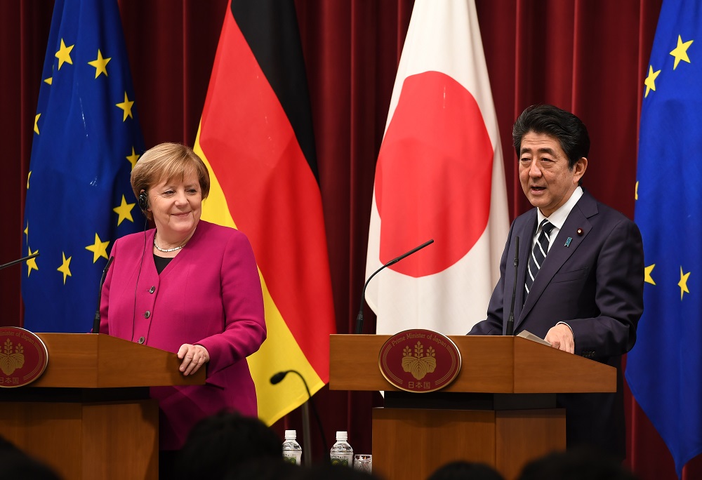 Japanese Prime Minister Shinzo Abe and his German counterpart, Angela Merkel, agreed on Thursday that their countries will collaborate on the development of coronavirus treatments and vaccines. (AFP)
