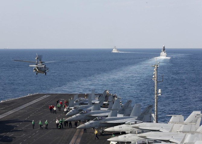 The US aircraft carrier strike group Abraham Lincoln sailed through the key Strait of Hormuz on in November, 2019 to show Washington’s “commitment” to freedom of navigation, the Pentagon said, amid tensions with Tehran. (File/AFP)